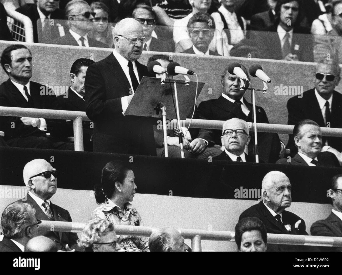 IOC president Avery Brundage (USA) speaks, on 6 September 1972 at the Munich Olympic Stadium, during the memorial ceremony for the victims of the terrorist attack on the Israeli Olympic team during the Summer Olympics. Federal President Dr Gustav Heinemann and NOK president Willi Daume are sitting to his right. Arabian terrorists of the group 'Black September' had attacked the Israeli accommodation in the Olympic village, killed two Israelis and took nine hostages. The rescue operation in the night of 6th September at the military airport Fürstenfeldbruck fails. The nine hostages, a Munich pol Stock Photo