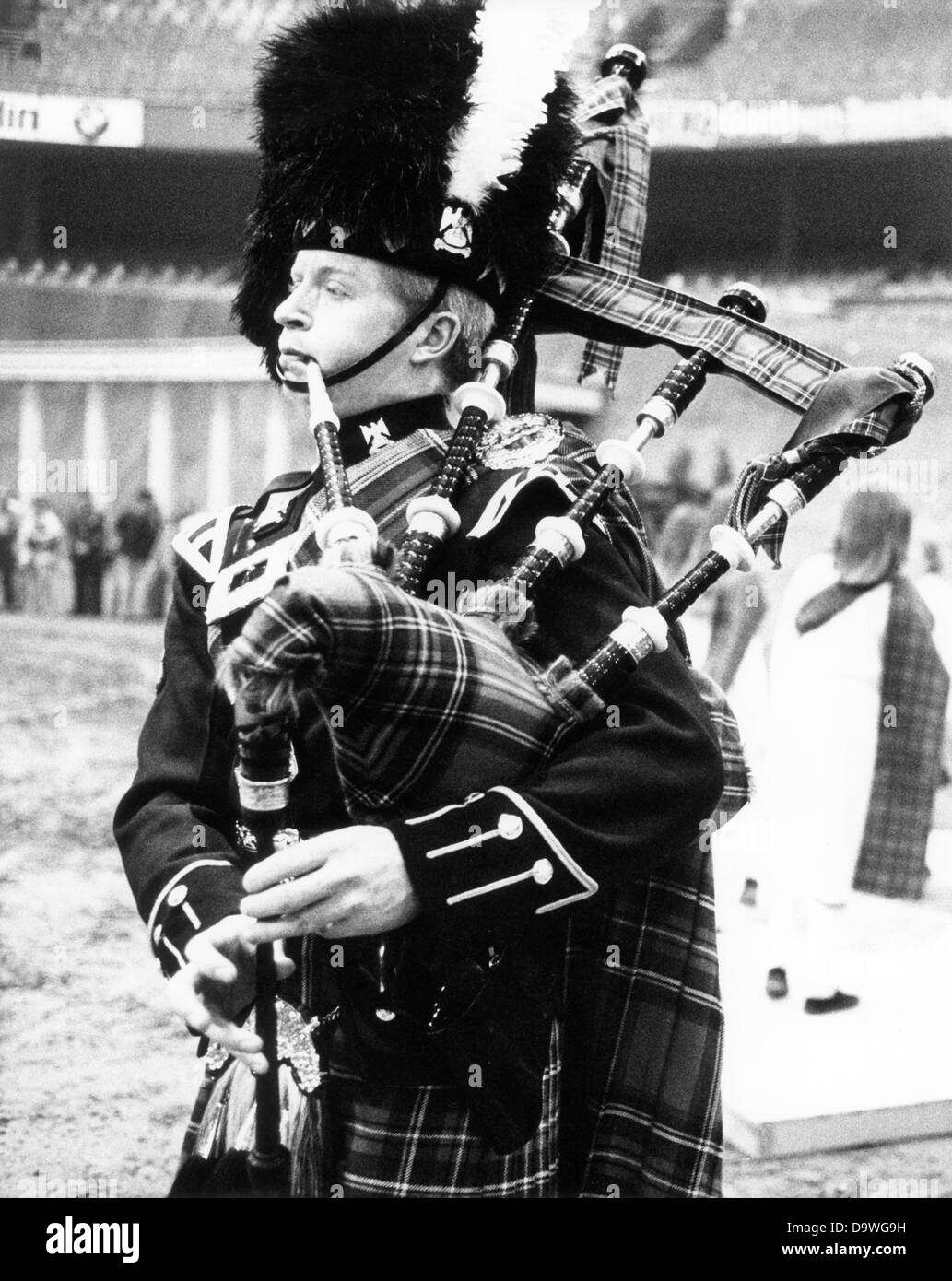 black bagpipe player image black bagpipe player image