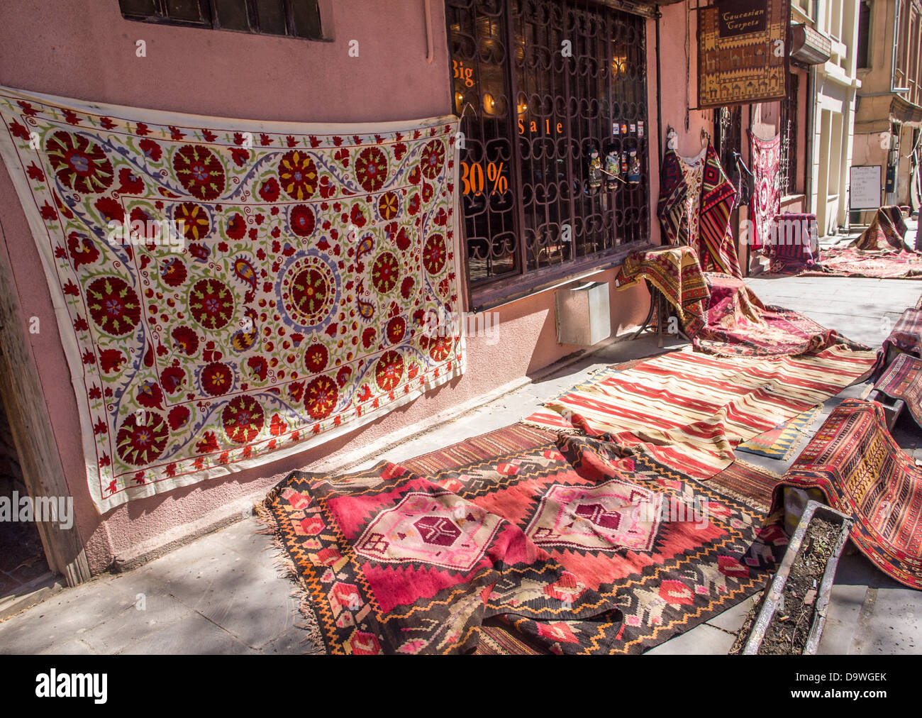 Rug store in downtown of Tbilisi, Stock Photo Alamy