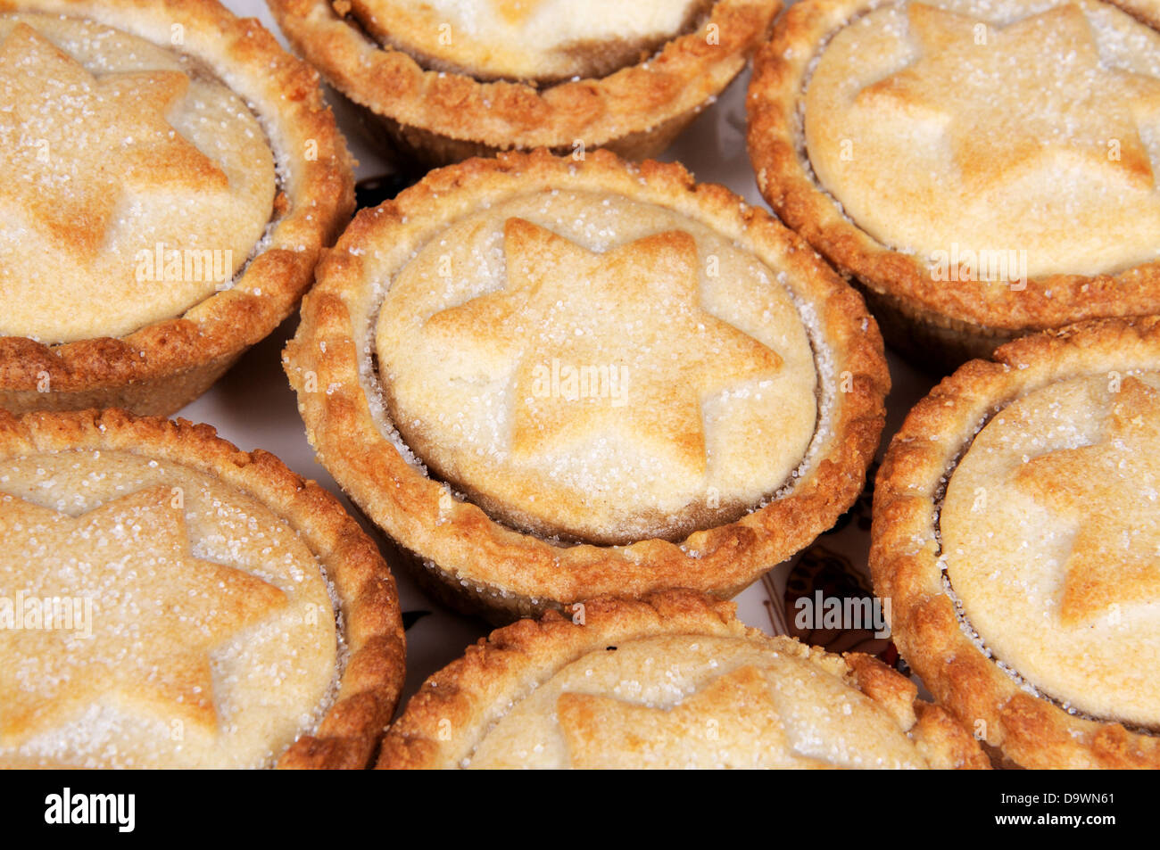 Mince pies with star shapes on the lids Stock Photo - Alamy