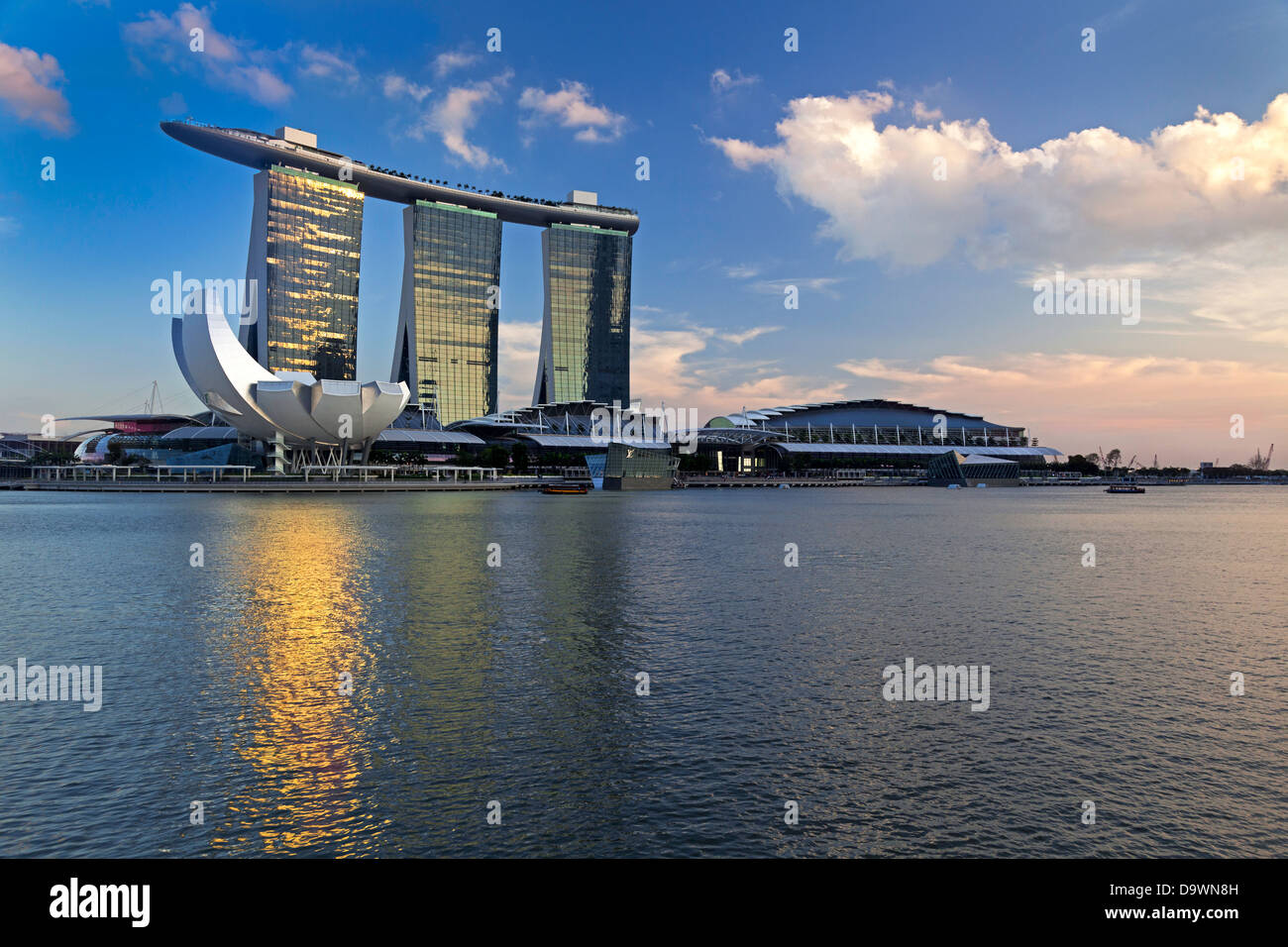 Southeast Asia, Singapore, the Helix bridge leading across Marina Bay to the Marina Bay Sands hotel and resort Stock Photo