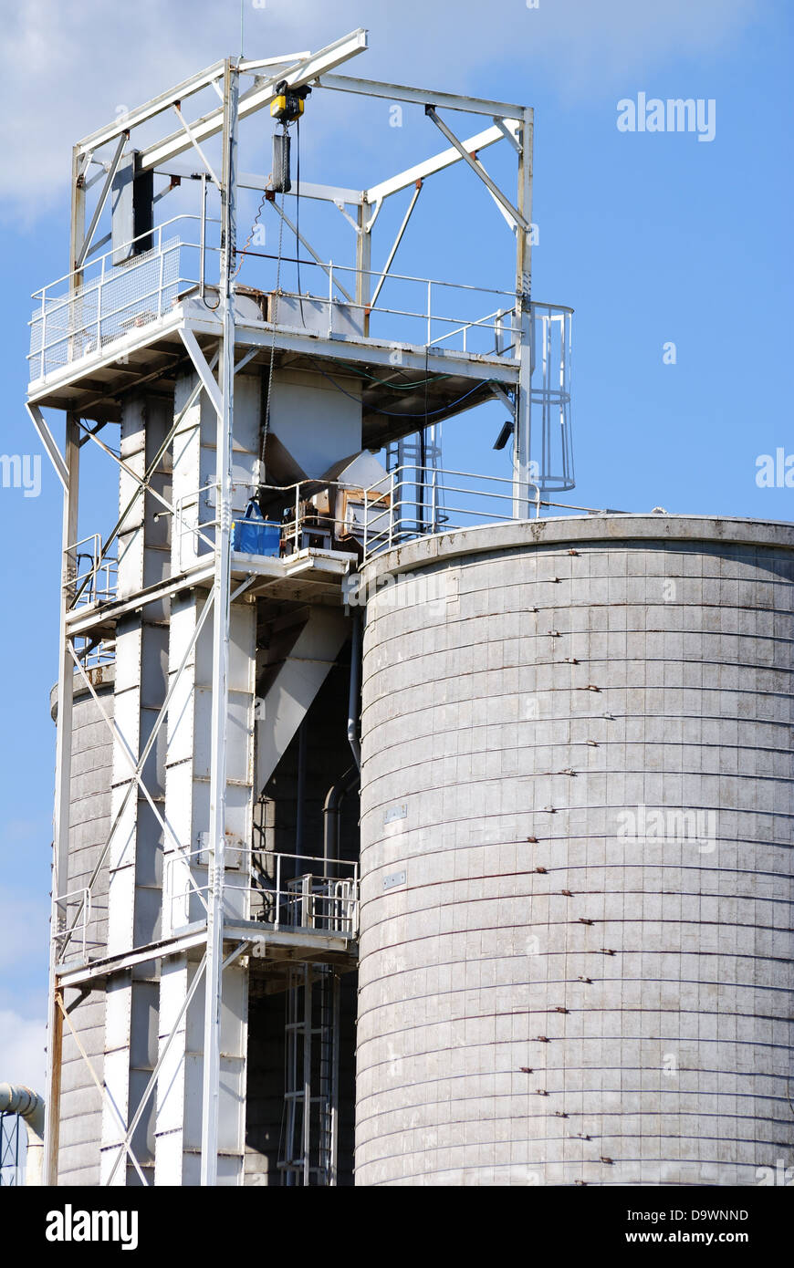 Factory silo and industrial gantry details Stock Photo