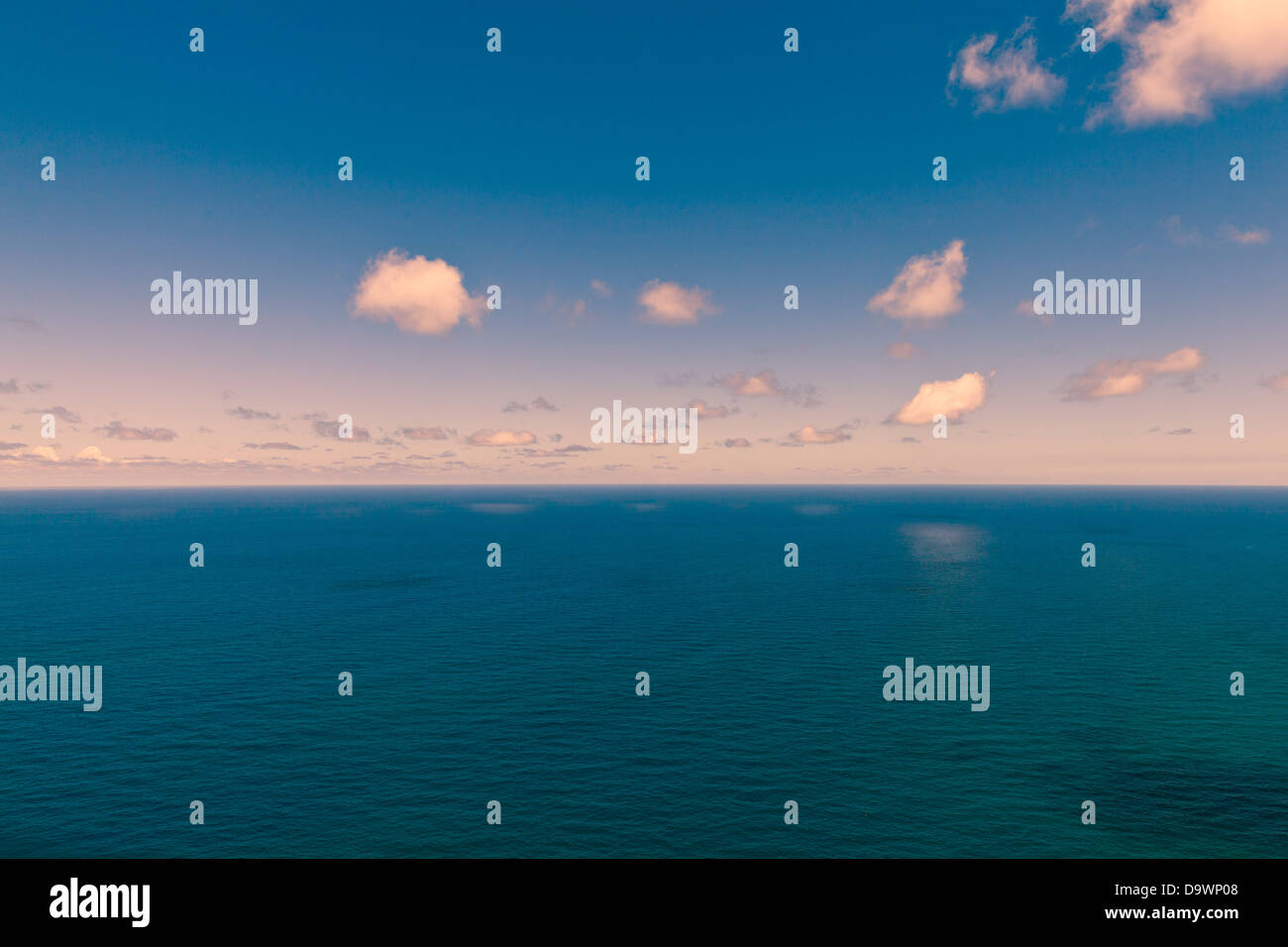 Blue ocean clouds in clear hi-res stock photography and images - Alamy