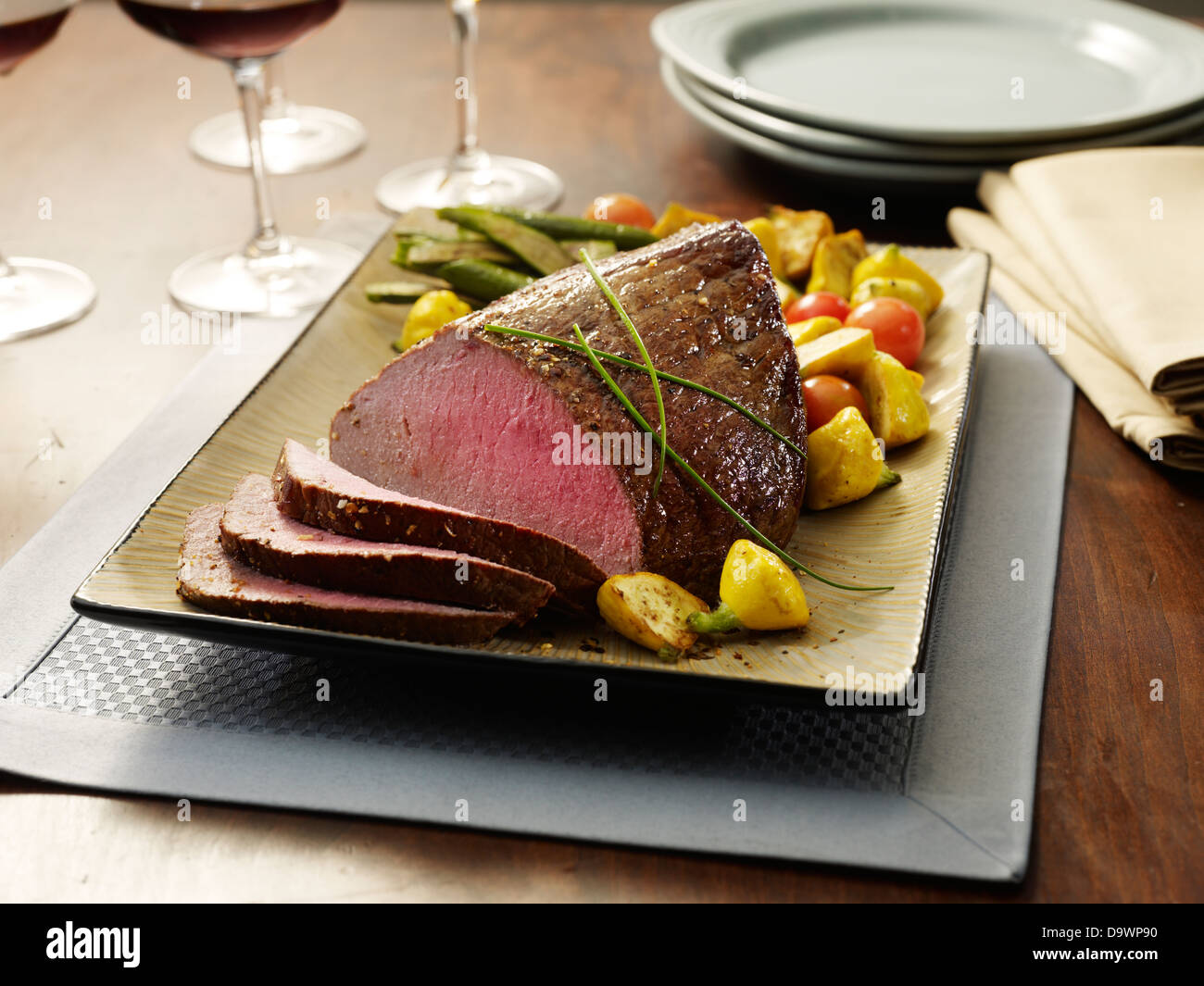 top round roast netted cut Stock Photo Alamy