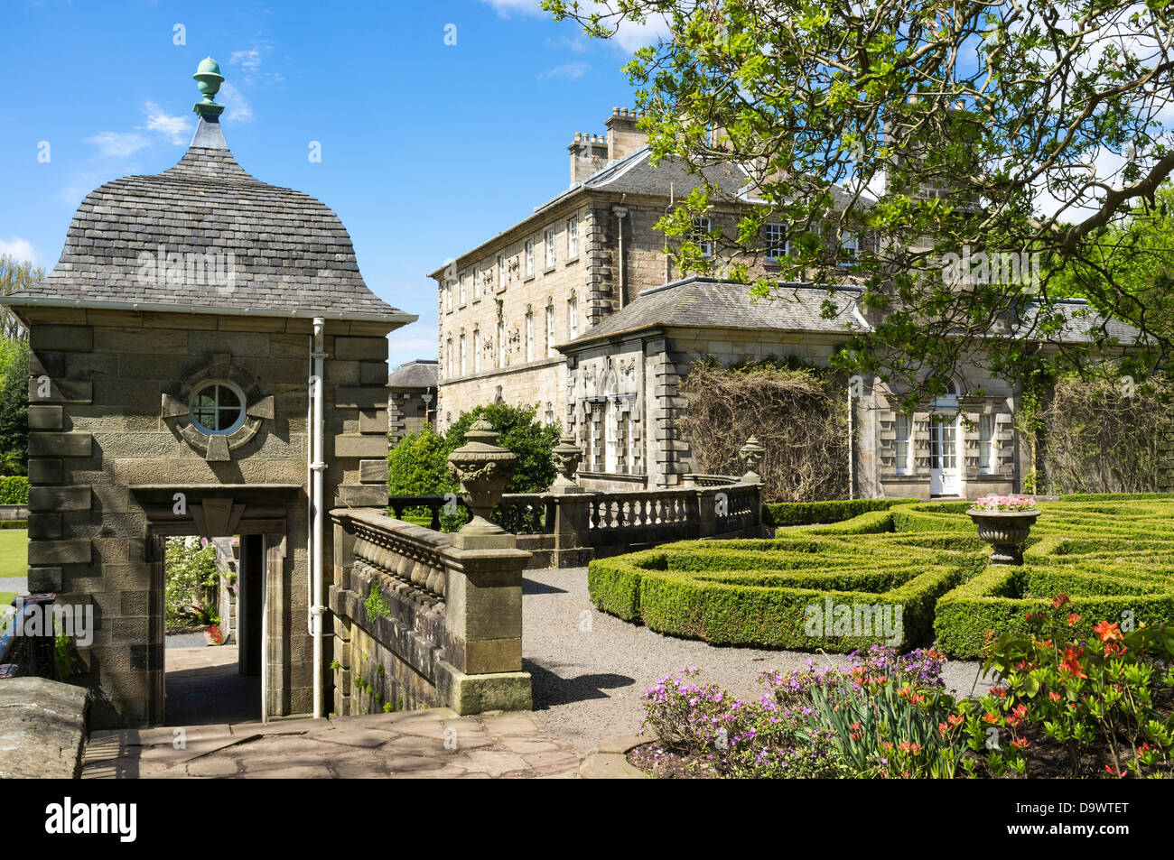 View of the west pavilion and topiary gardens at Pollok House, Glasgow Stock Photo