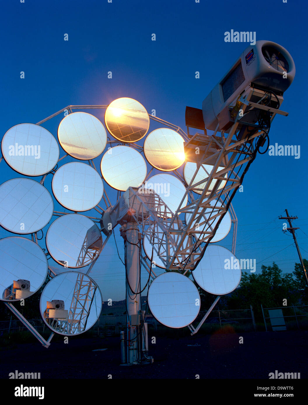 Stirling Solar power systems solar dish engine June 12, 1996 in Golden,  Colorado. The dish produces electricity uses mirrors to focus sunlight onto  a thermal receiver. The heat is used to run