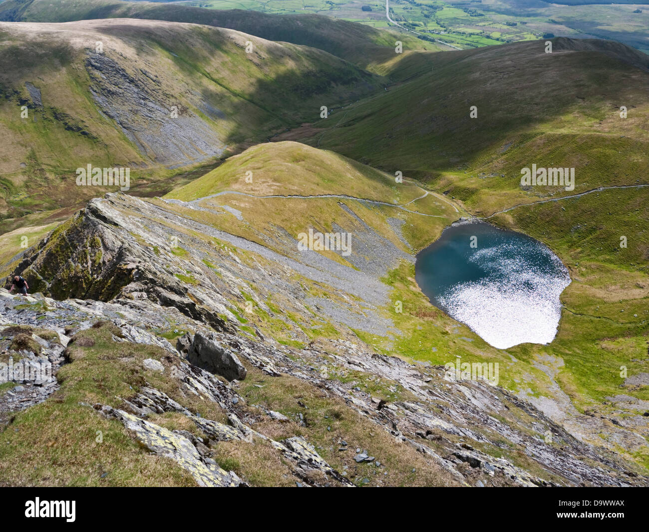 View over Sharp Edge and Scales Tarn from near the summit of Blencathra (or Saddleback), a mountain in the English Lake District Stock Photo