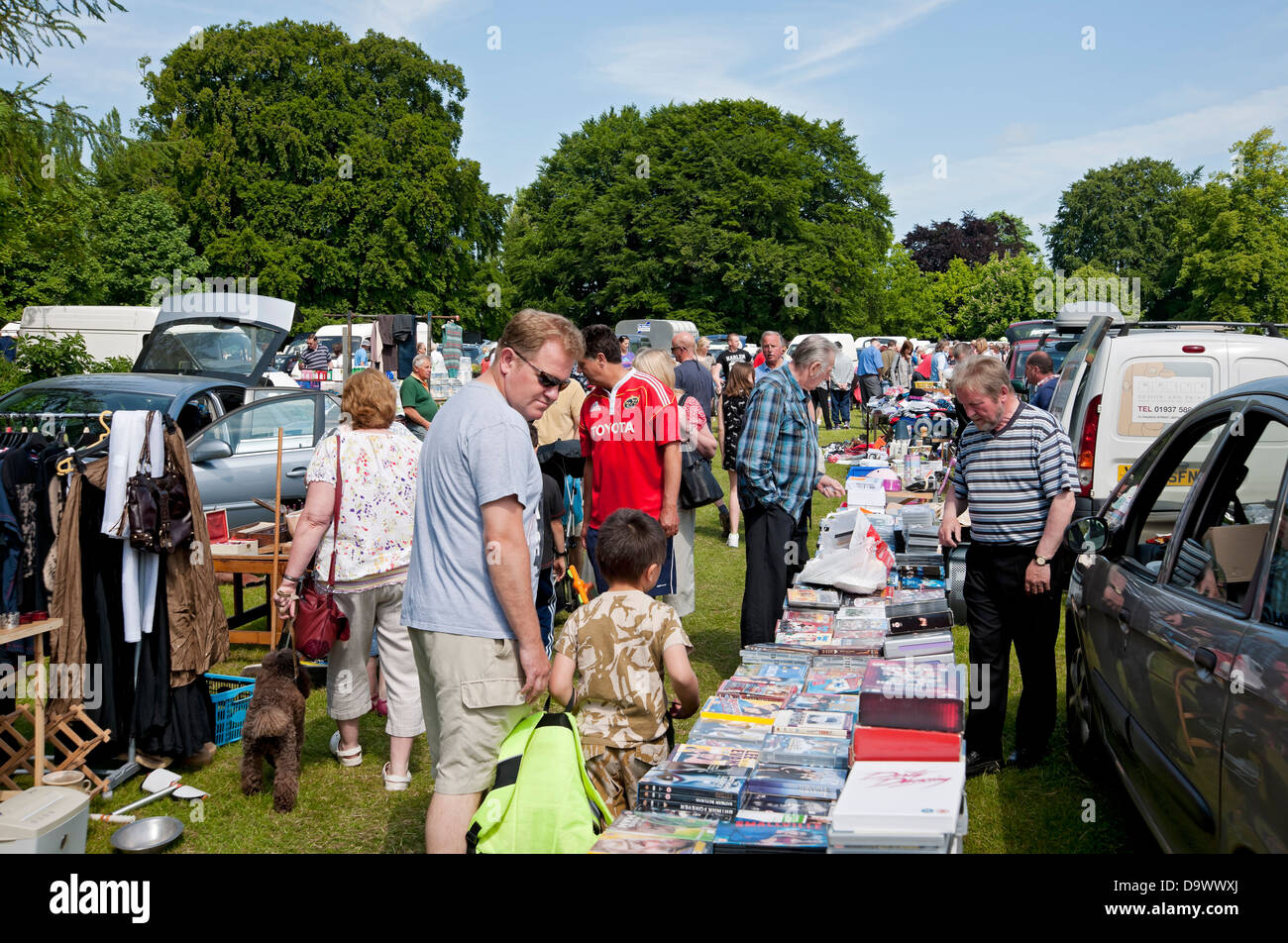 People visiting carboot car boot sale in summer Bedale North Yorkshire