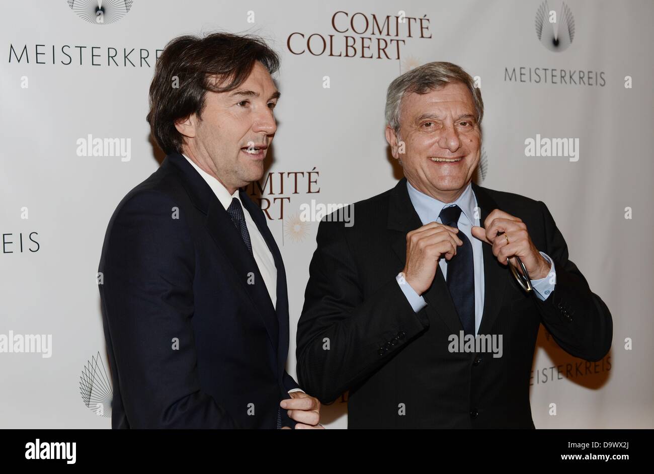 The CEO of Christian Dior S.A. and president of Christian Dior Couture S.A,  Sidney Toledano (R), and the managing director of the German association of  luxury producers 'Meisterkreis' , Clemens Pflanz, arrive