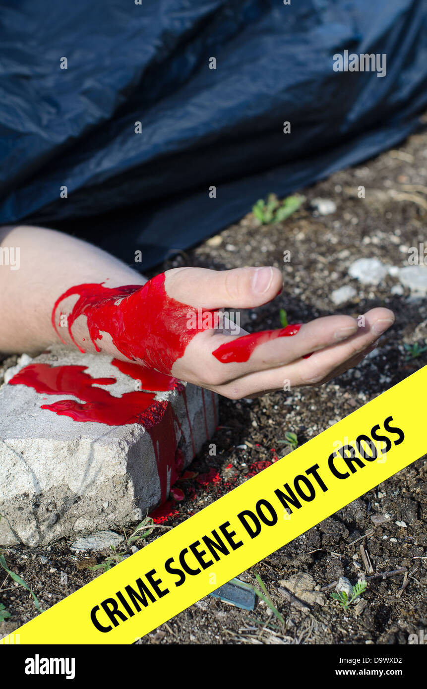 Close up view of bloody hand. Crime scene Stock Photo