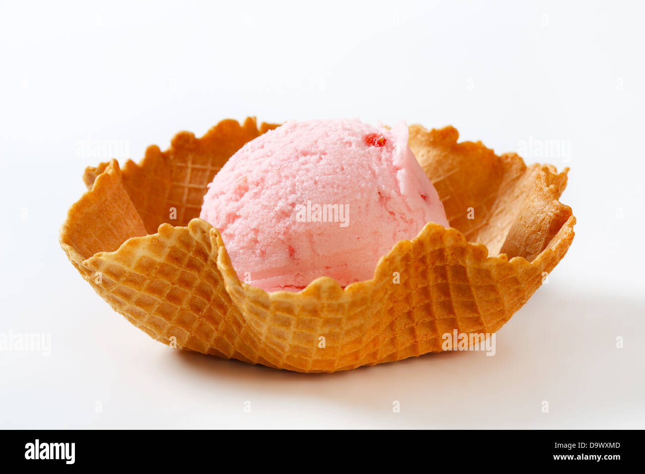 Pink ice cream in a waffle basket Stock Photo