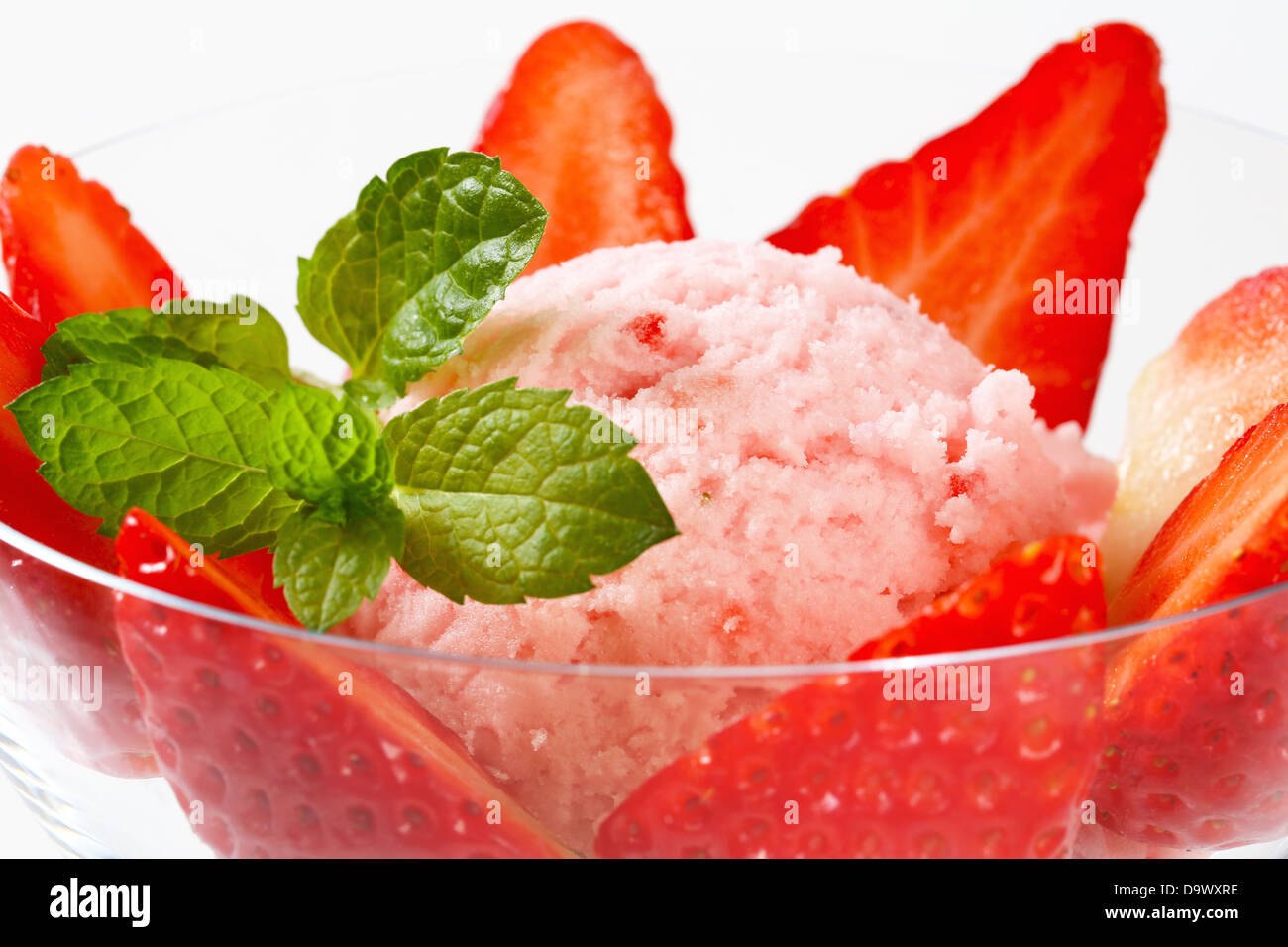 Ice cream with fresh strawberries in a coupe Stock Photo