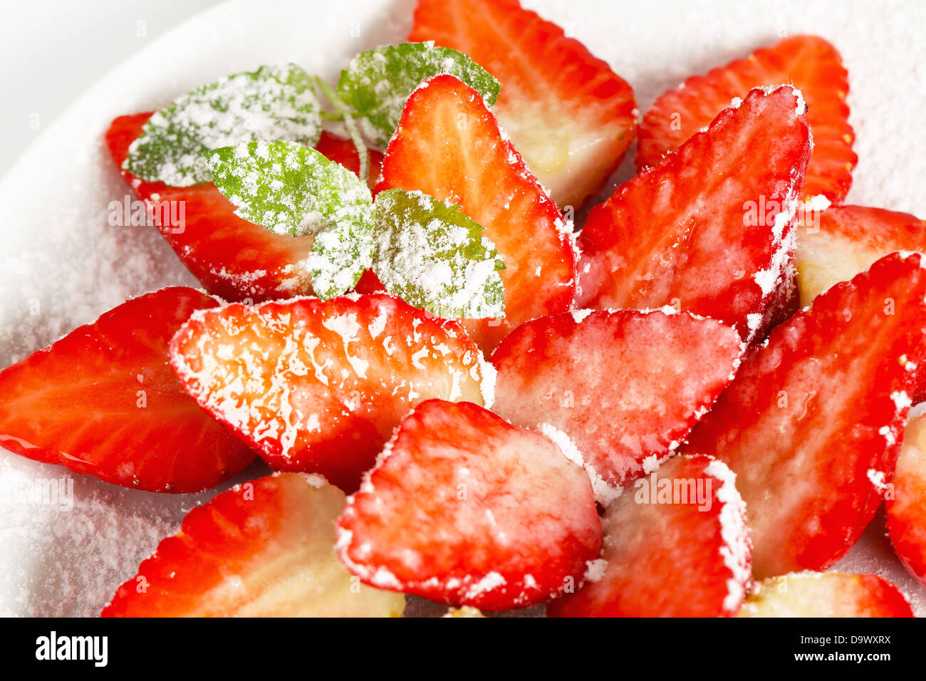 Strawberries halved hires stock photography and images Alamy