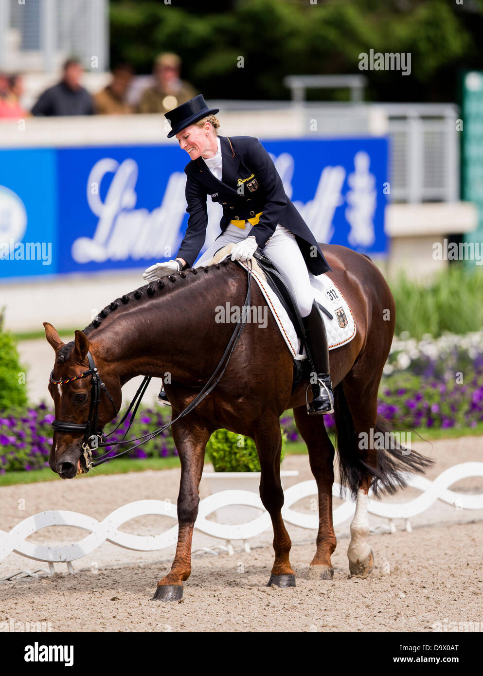German equestrian Helen Langehanenberg thanks her horse Damon Hill NRW