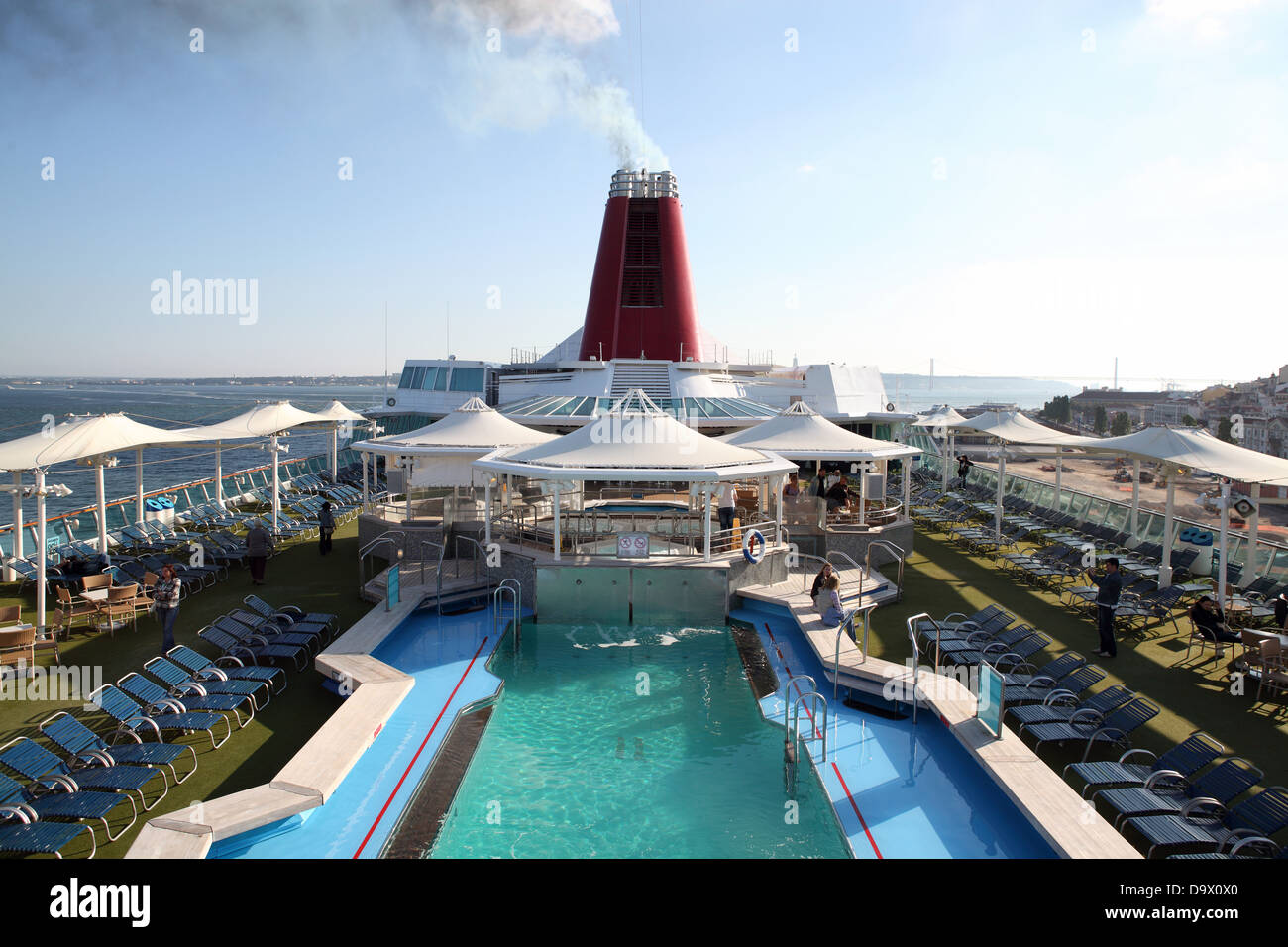 Upper main deck Cruise ship swimming pool safety boat Stock Photo