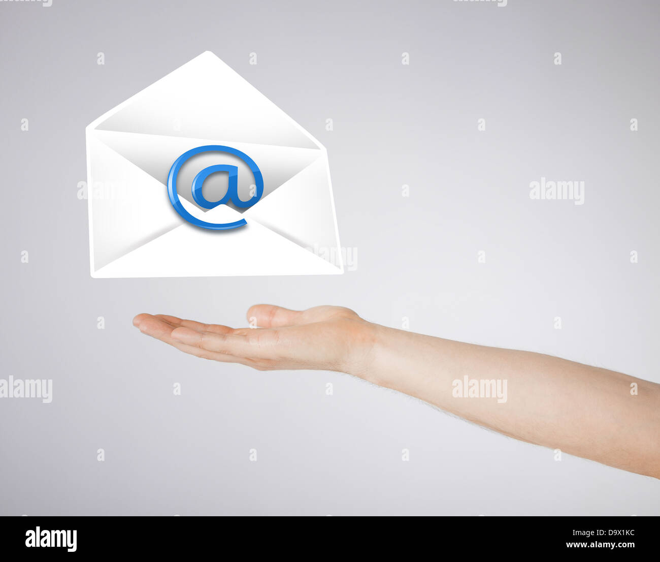 hand holding envelope with email sign Stock Photo Alamy