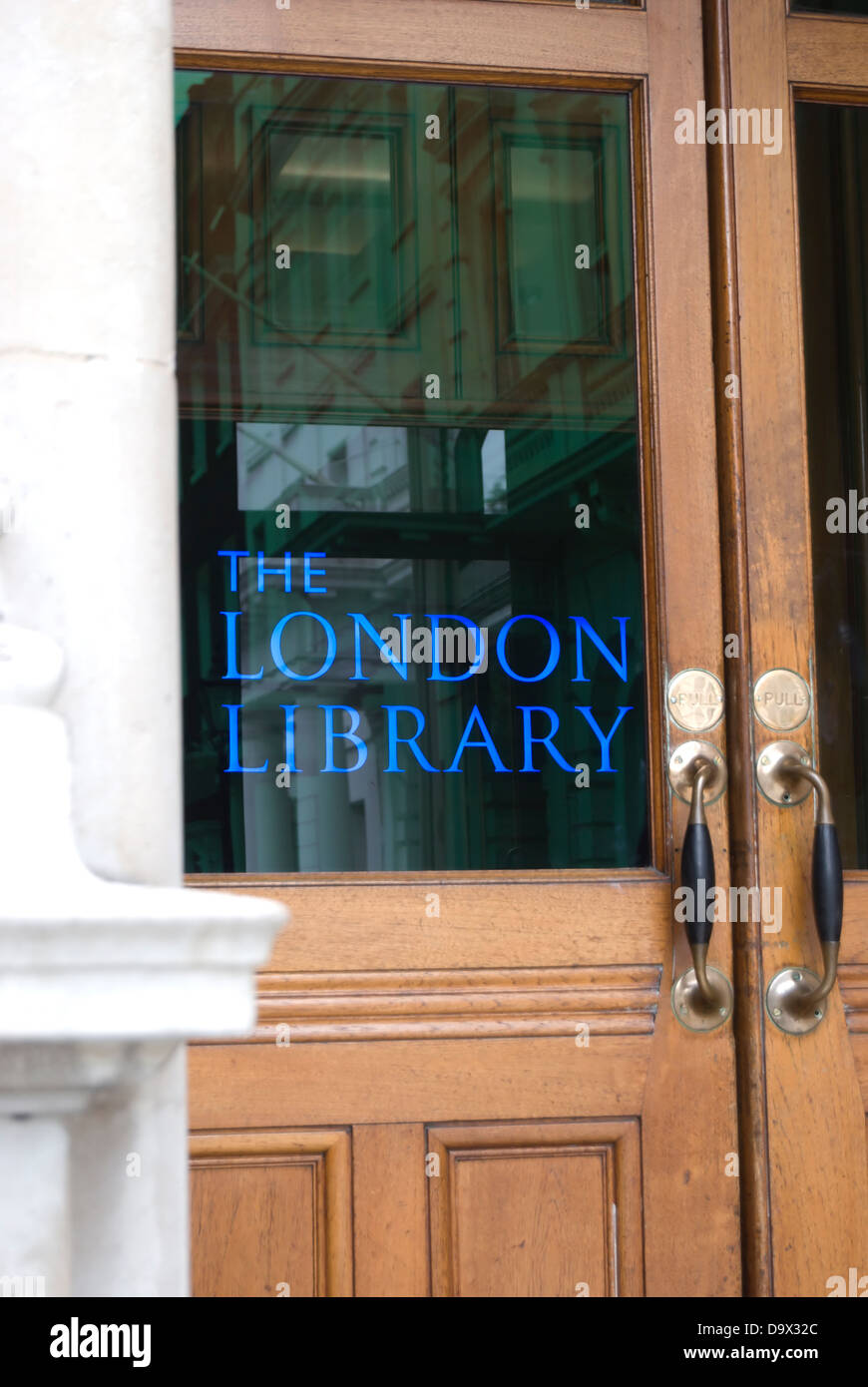entrance  of the london library, st james's square, london, england, with library name etched onto door Stock Photo
