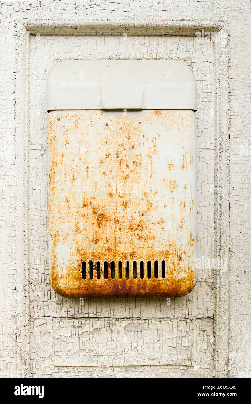 Old white wall with mailbox Stock Photo