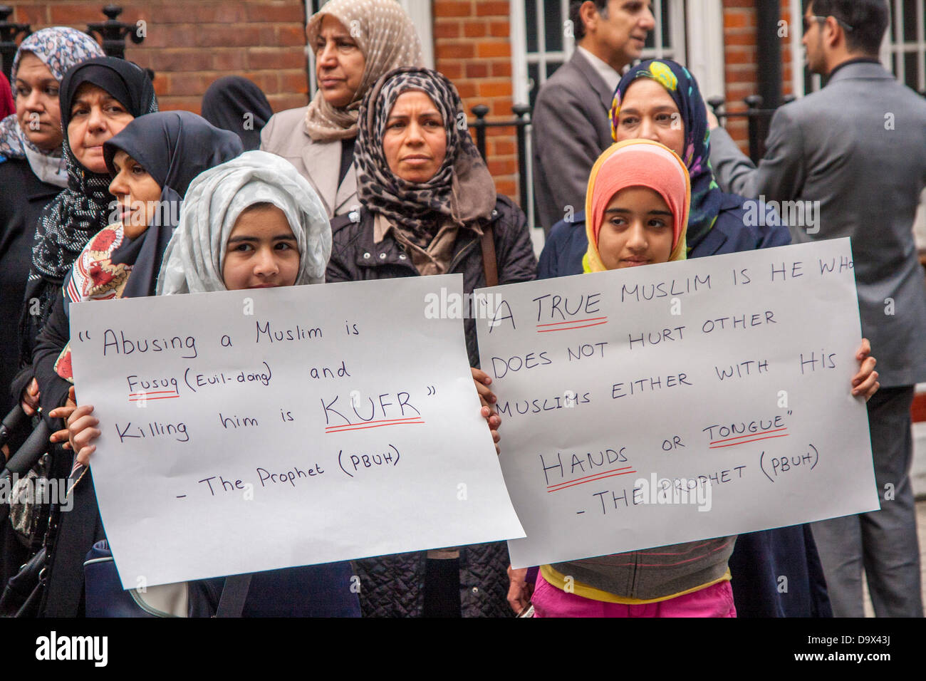 London, UK. 27th June 2013. Young Muslim girls with their posters promoting tolerance as Egyptians in London protest against sectarian killings in Egypt. Credit:  Paul Davey/Alamy Live News Stock Photo