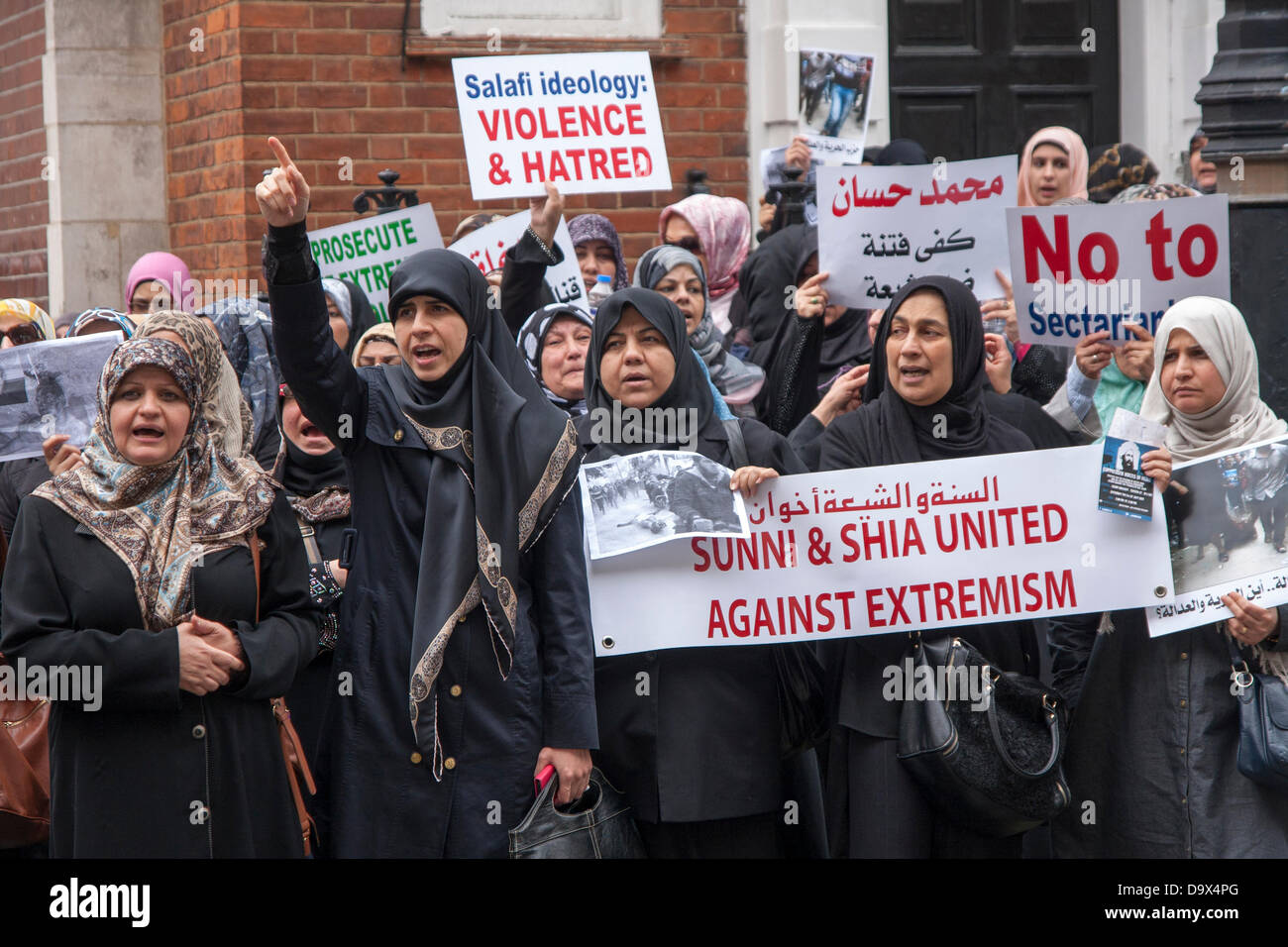London, UK. 27th June 2013.  Muslim women chant slogans as Egyptians in London protest against sectarian killings in Egypt. Credit:  Paul Davey/Alamy Live News Stock Photo