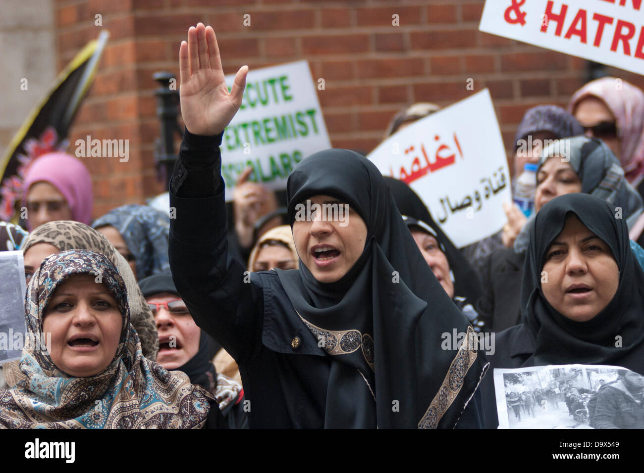 London, UK. 27th June 2013. A Muslim woman chants slogans as Egyptians in London protest against sectarian killings in Egypt. Credit:  Paul Davey/Alamy Live News Stock Photo