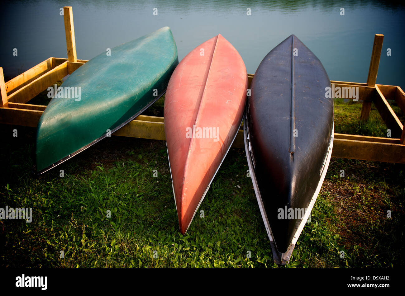 Canoes by a lake Stock Photo