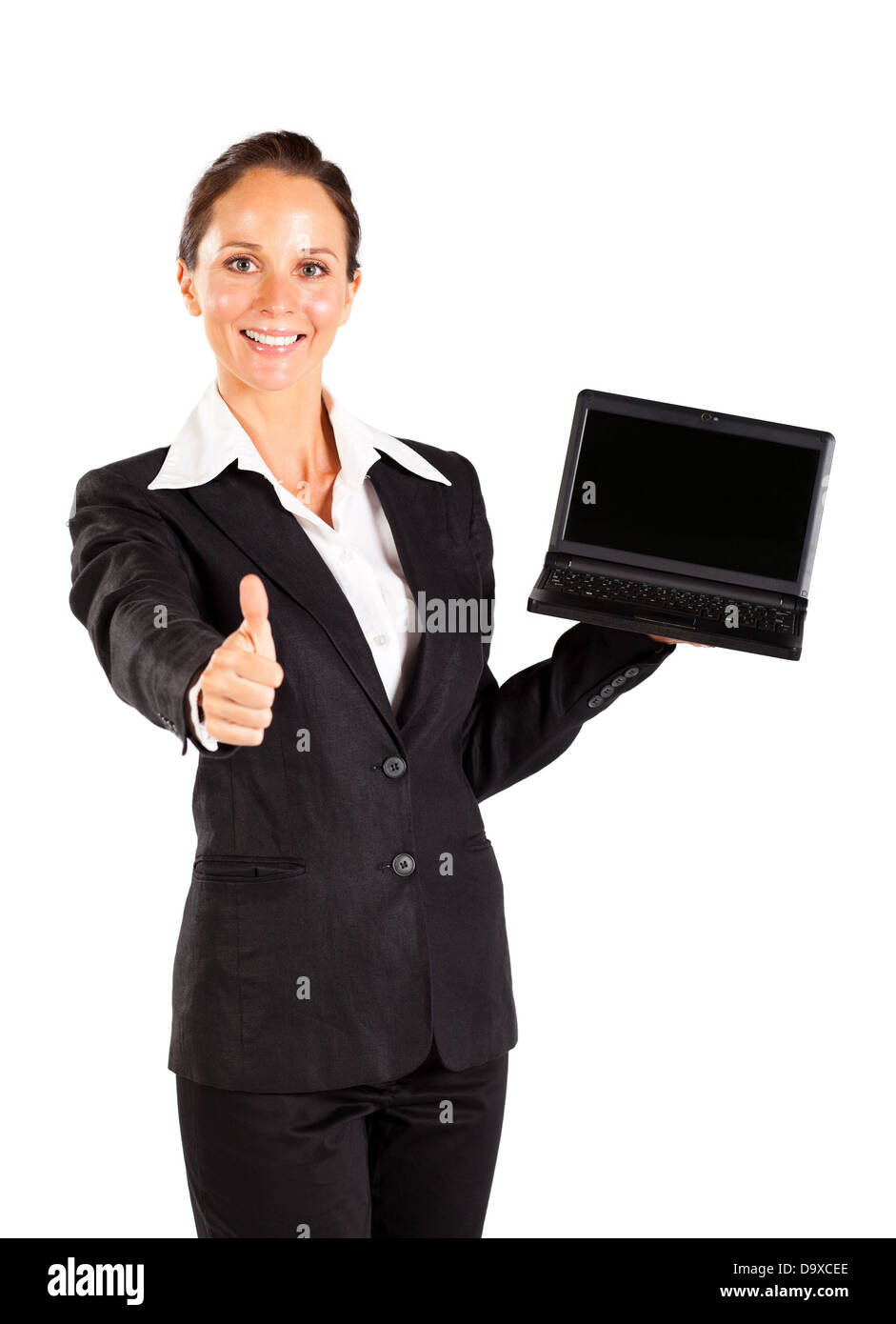 businesswoman holding laptop and giving thumb up Stock Photo - Alamy
