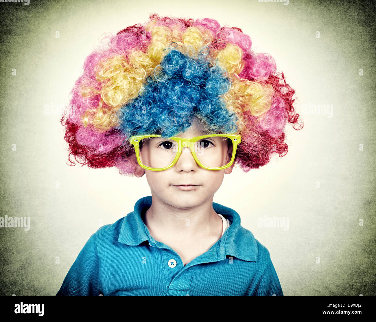 Little boy wearing clown wig in vintage technique Stock Photo