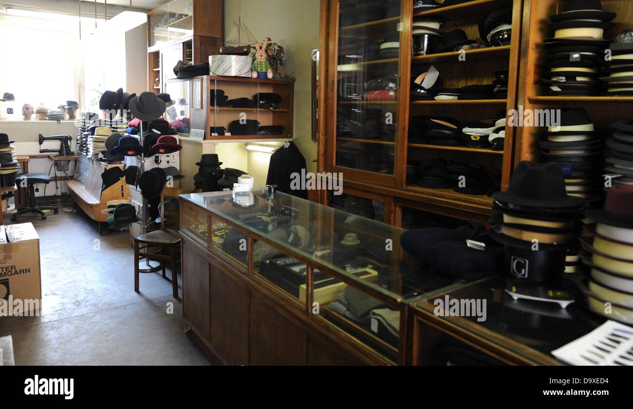 Hats and caps are piled up in the shop of cap maker Kuentzel in Hamburg