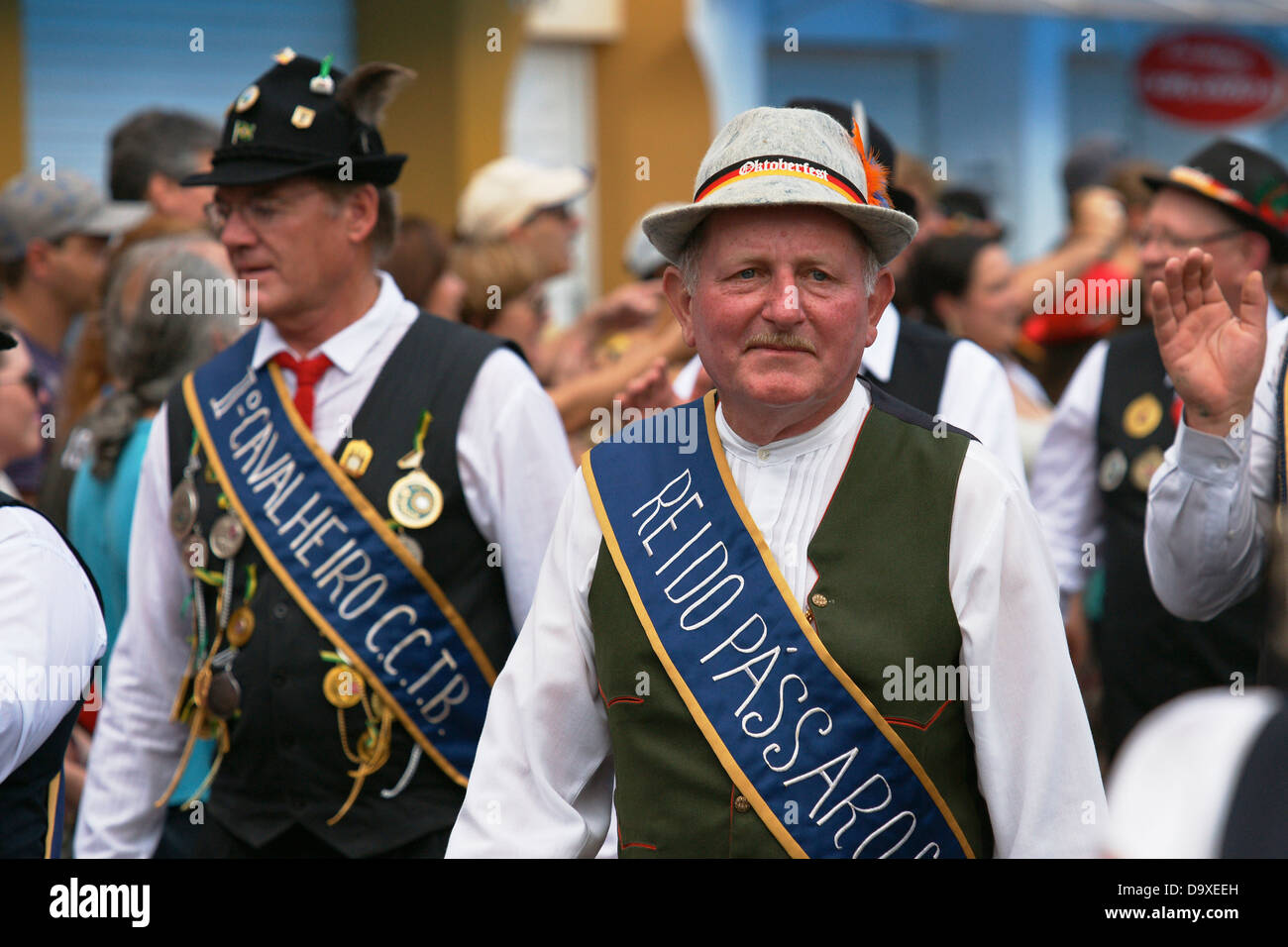Bavarian style men of a local gun shooting club during the Oktoberfest parade Stock Photo