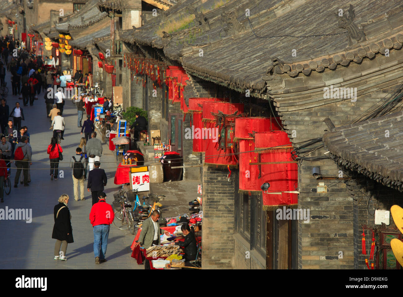 China, Shanxi Province, Pingyao County, Pingyao Ancient City, Traditional housing along Shang Xi Men Street Stock Photo