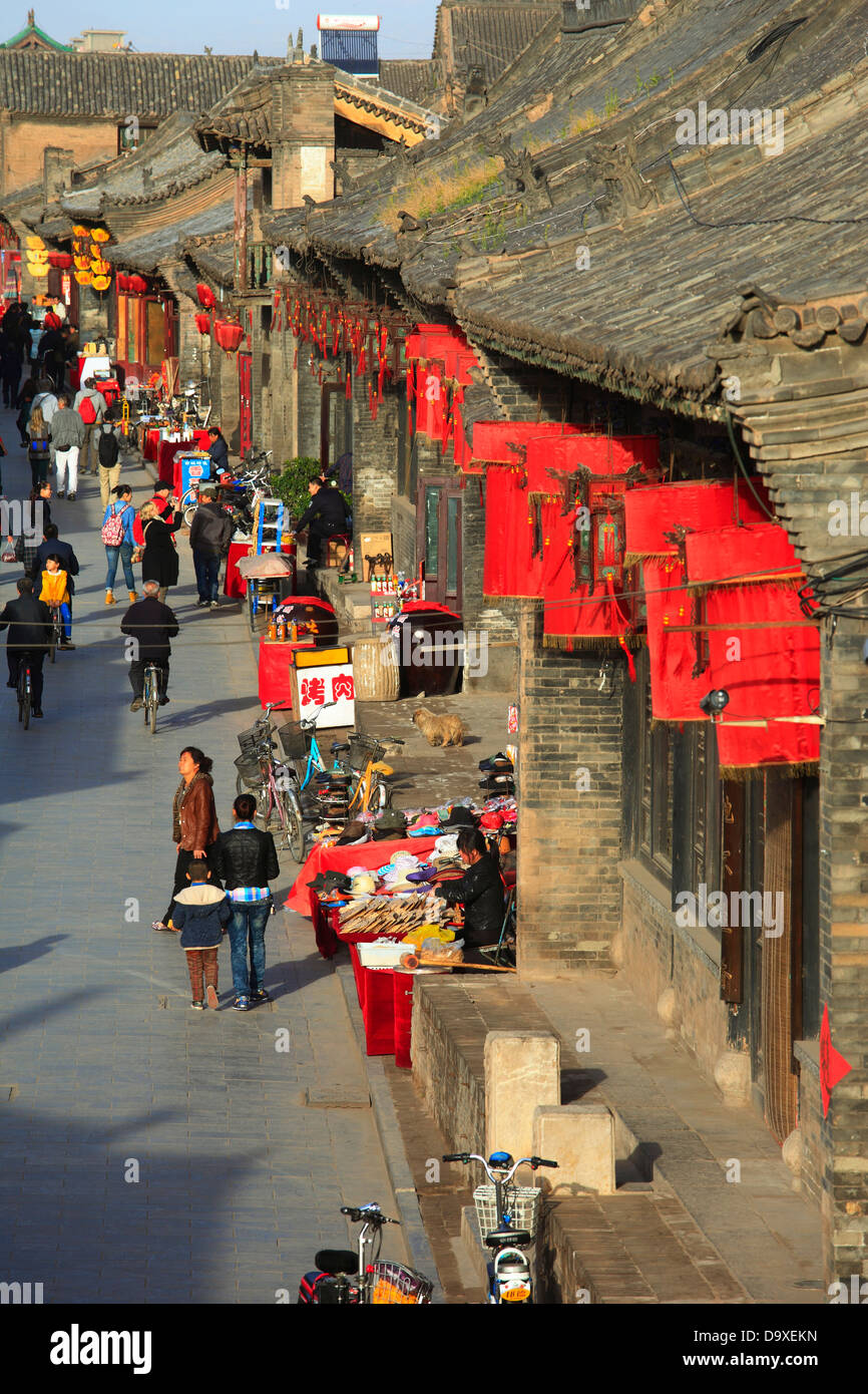 China, Shanxi Province, Pingyao County, Pingyao Ancient City, Traditional housing along Shang Xi Men Street Stock Photo
