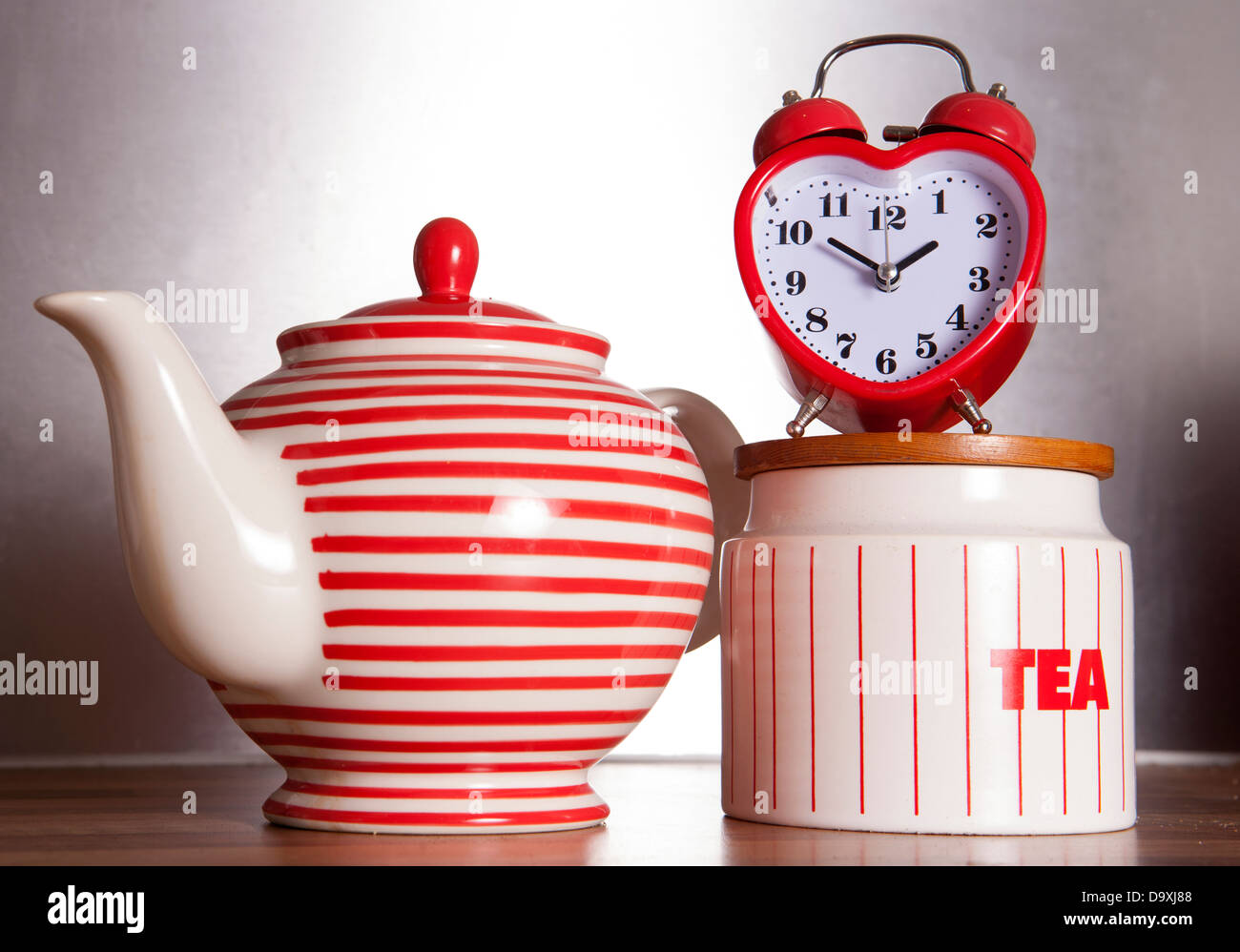 teapot and heart alarm clock Stock Photo