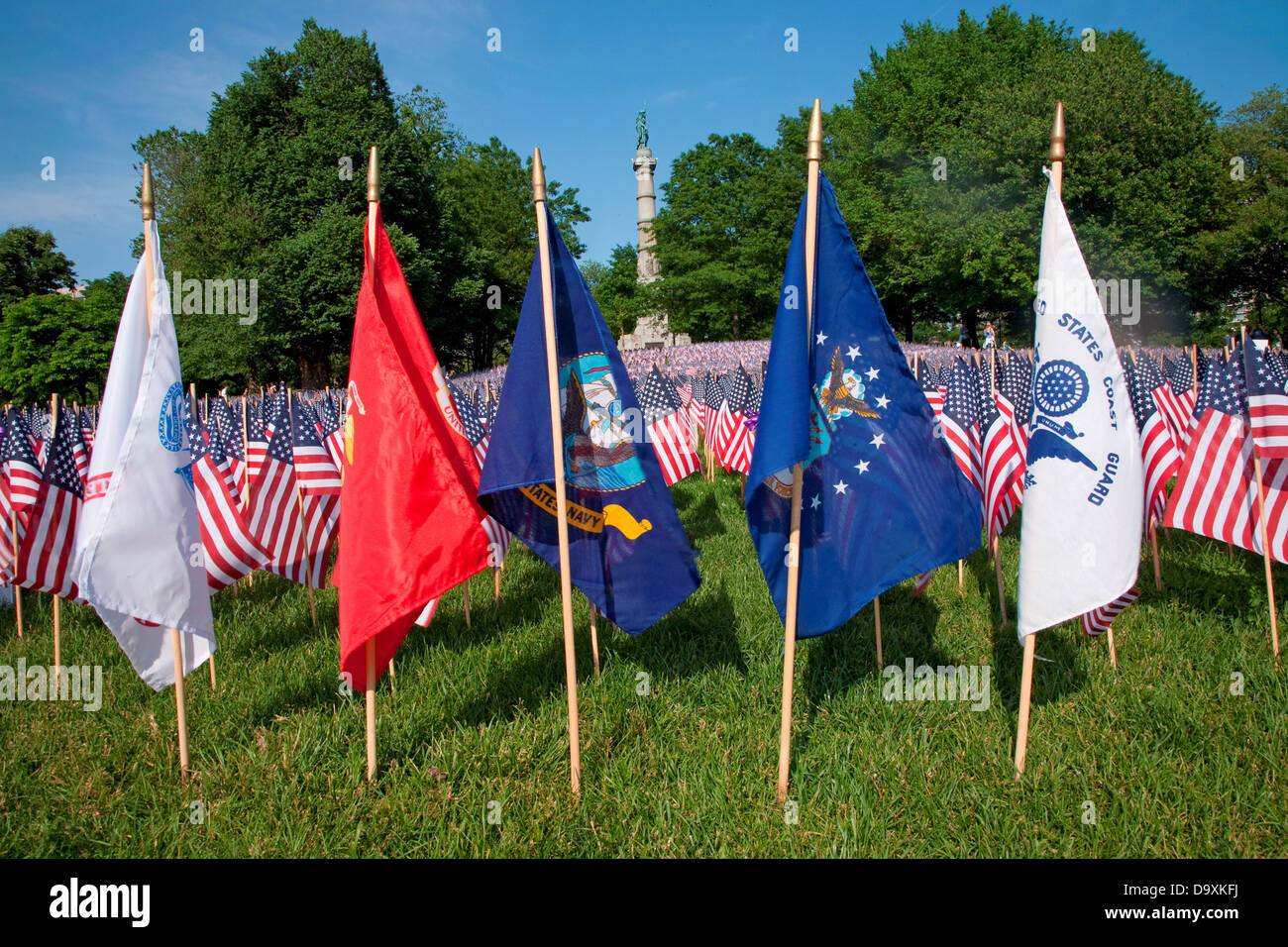 Armed Services Flags are in front 20,000 American Flags are displayed for every resident Massachusetts who died in war over Stock Photo