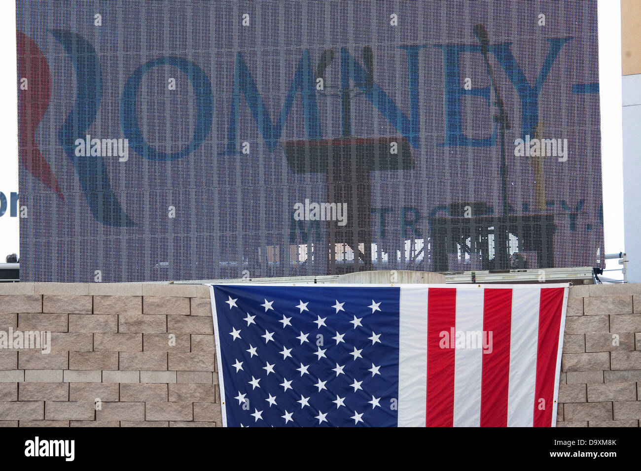 US Flag under sign for Governor Mitt Romney 2012 Republican Presidential Candidate Presidential Campaign rally in Henderson Stock Photo