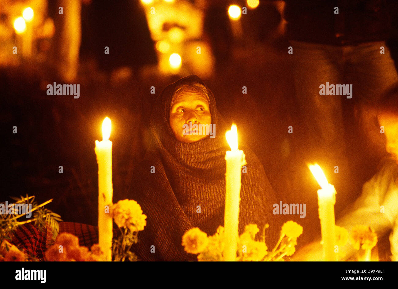 Graveside vigil with candles, Day of the Dead Festival, Michoacan