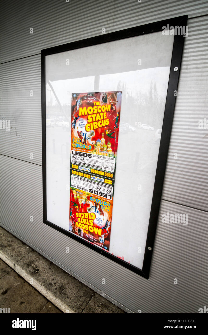 A pair of posters advertising the Moscow State Circus in a poster frame - one above the other with the lower one upside-down Stock Photo