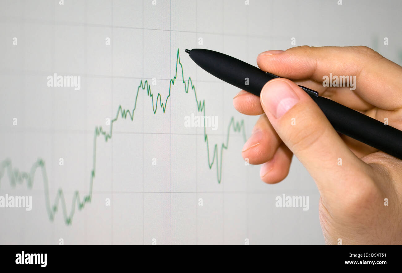 Hand showing graph Stock Photo Alamy