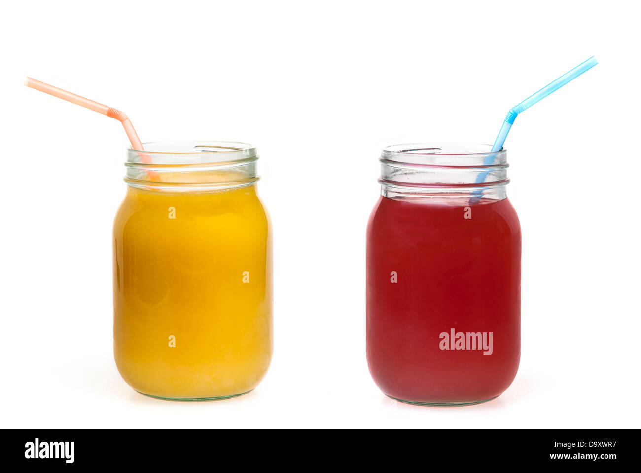 fresh orange juice and cranberry drink in a jam jar Stock Photo Alamy