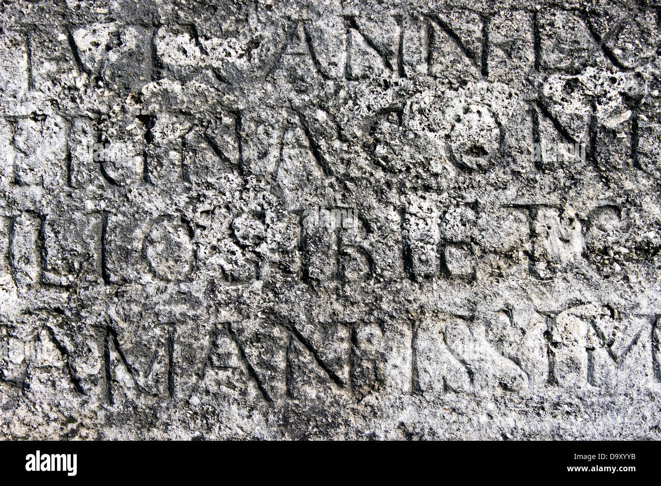 Roman letters stone texture as background Stock Photo