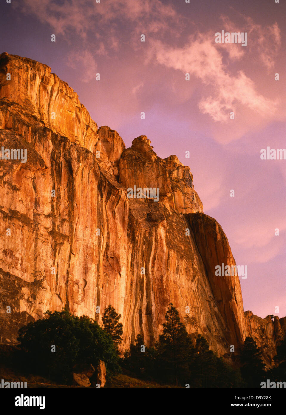 Storm light illuminating Inscription Rock, El Morro National Monument, New Mexico. Stock Photo