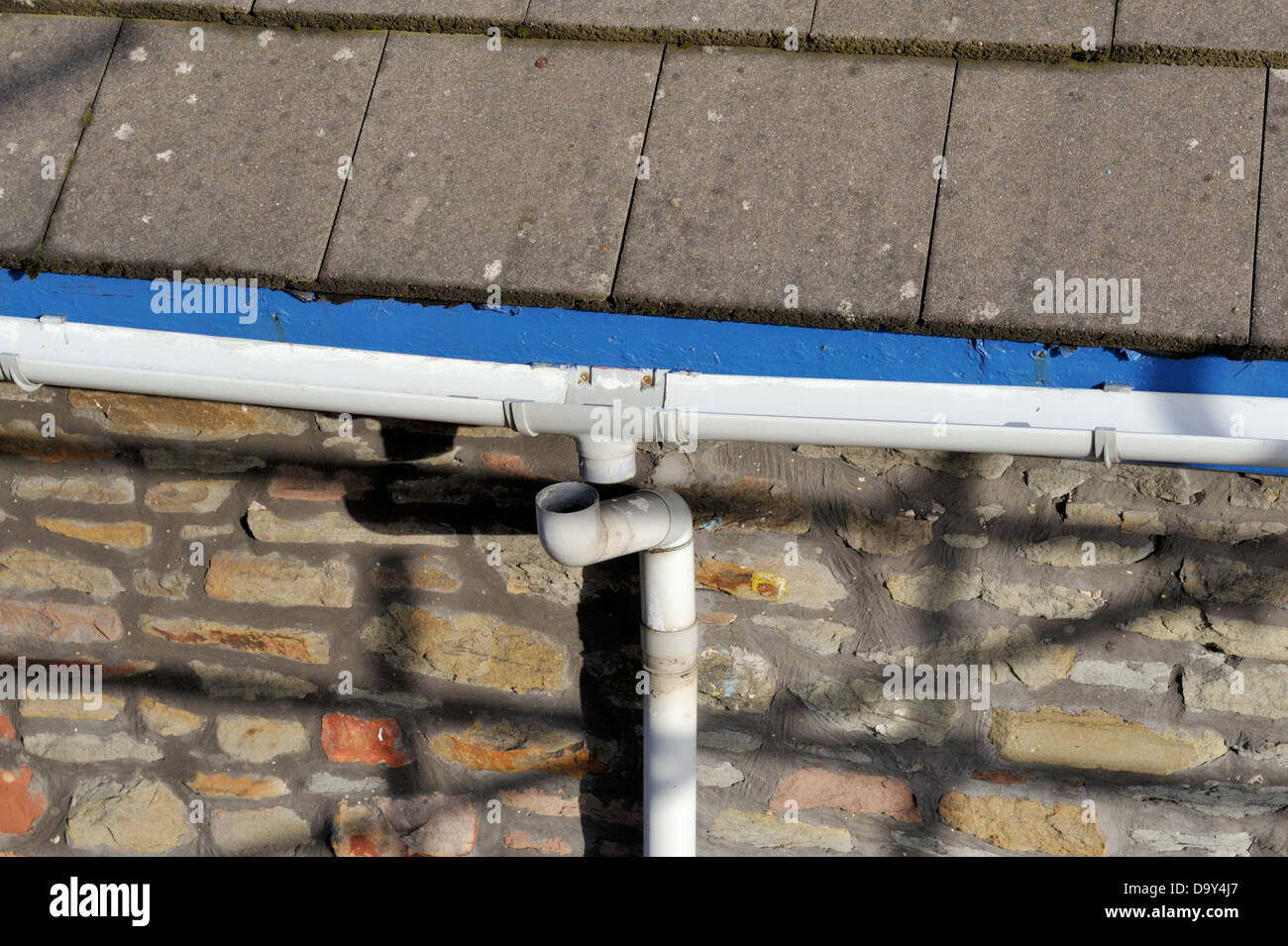 Rainwater downpipe that has disconnected from gutter to cause