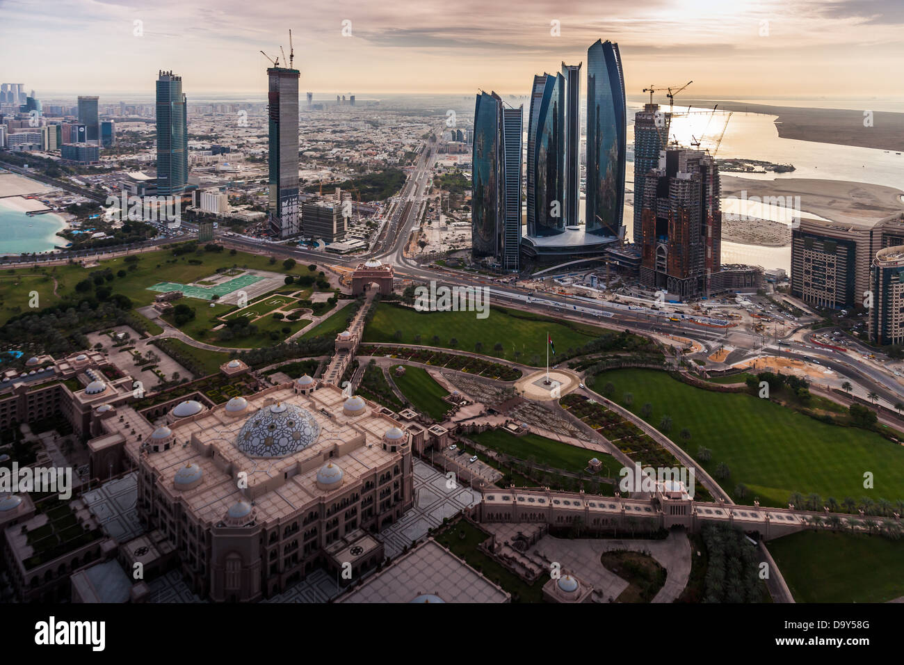 Aerial view of Abu Dhabi's major landmarks; Emirates Palace Hotel and Etihad Towers. Stock Photo