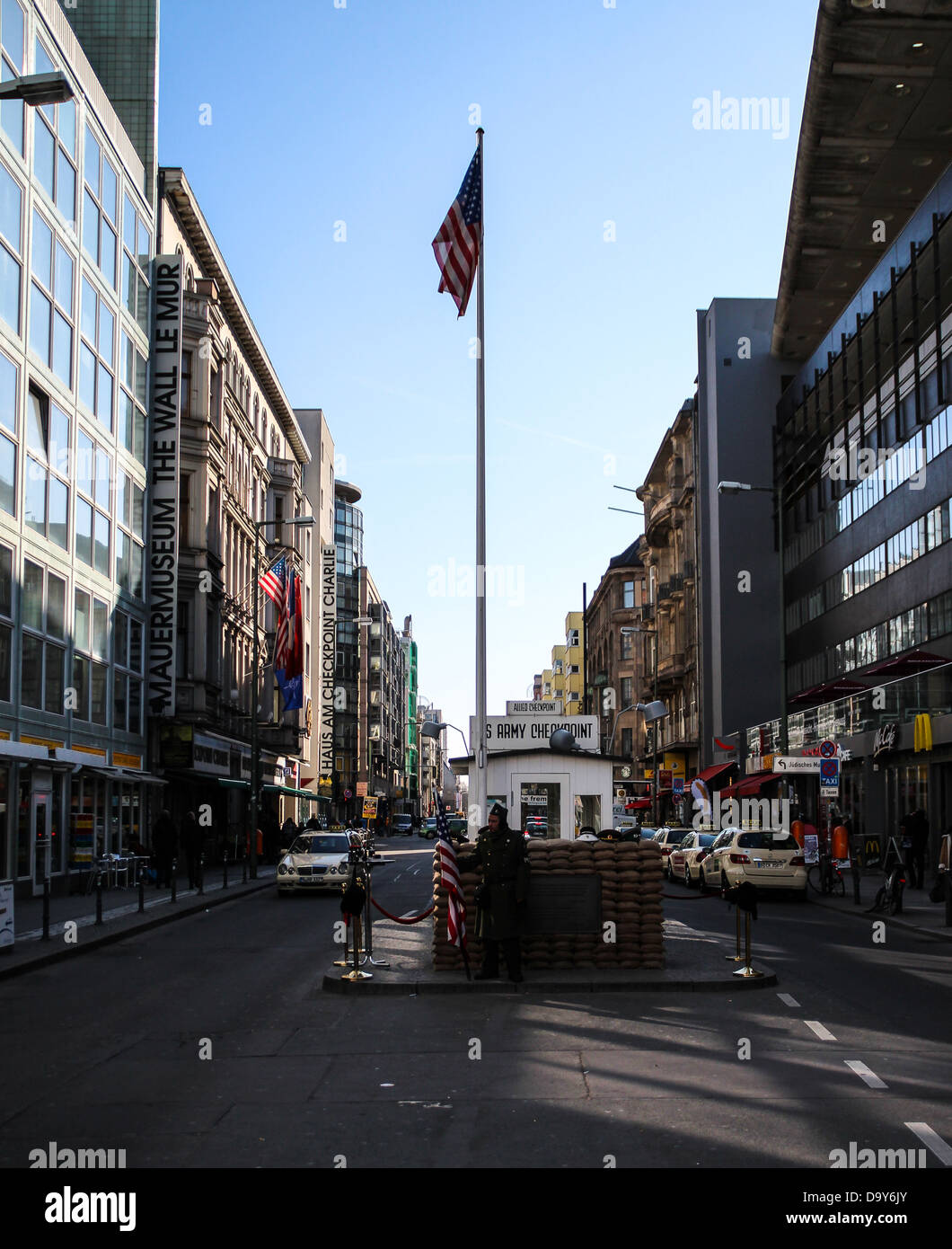 View of Checkpoint Charlie, passing through the Berlin Wall, the barrier that separated West Berlin (USA) from East Berlin (USSR) in the Cold War Stock Photo