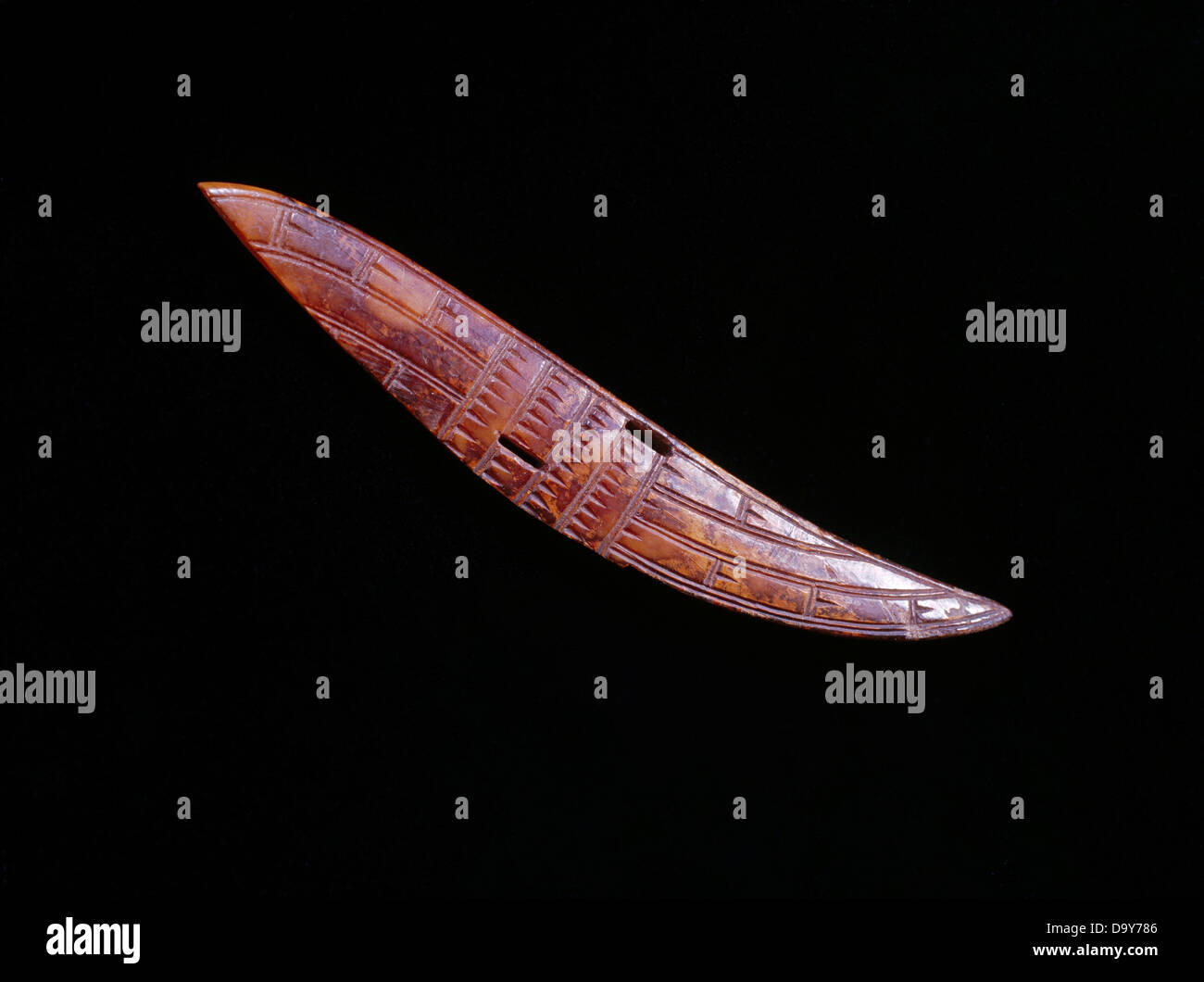 USA, Alaska, St. Lawrence Island, Ancient etched wrist guard for bow