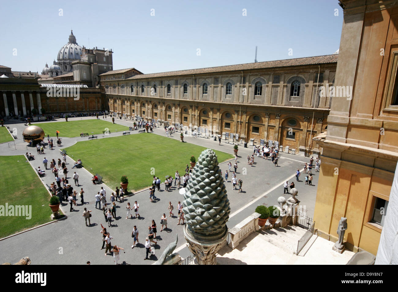 Cortile della Pigna (Courtyard of the pine cone), Vatican Museum, St  Peter's Basilica Dome on the background Vatican Rome Italy Stock Photo -  Alamy