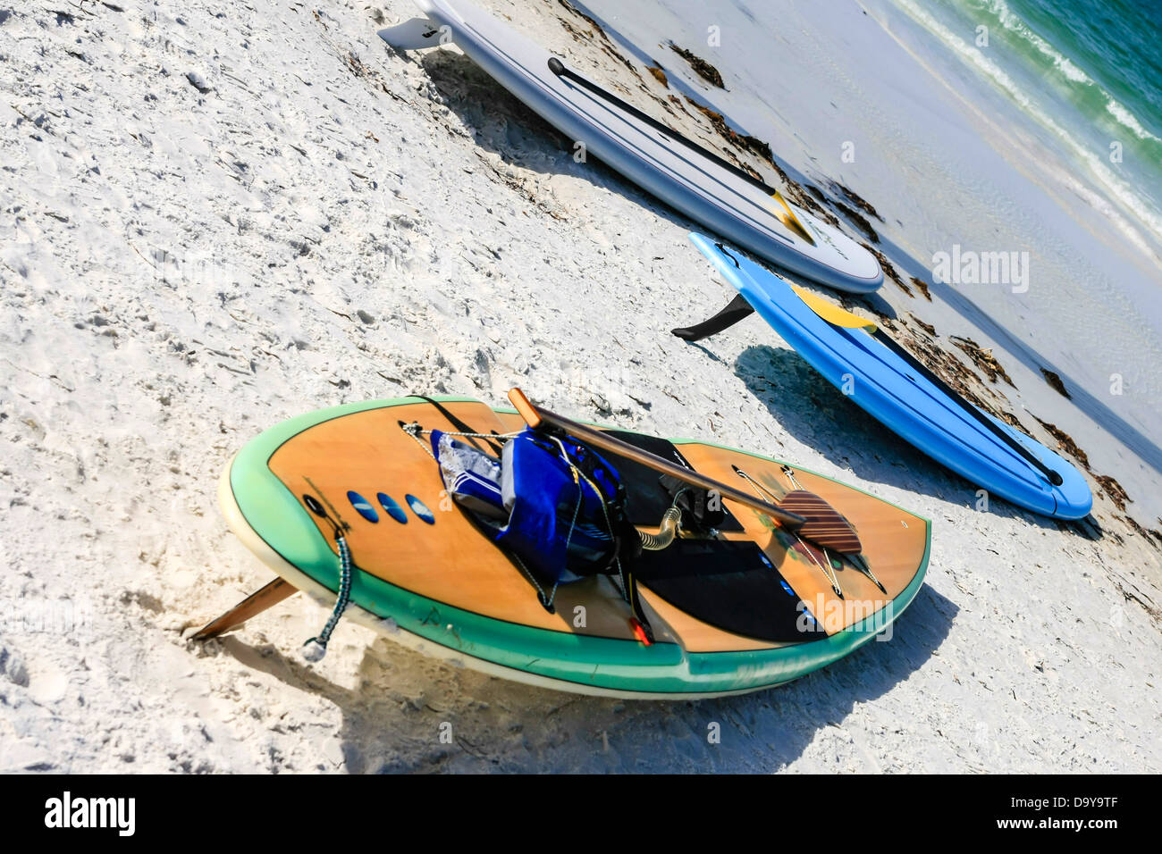 Paddle-boards lie on Siesta Key beach in Florida Stock Photo