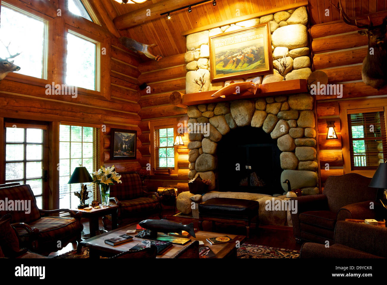 Wooden plank peeled logs walls great room Gold River Lodge fishing resort Stock Photo