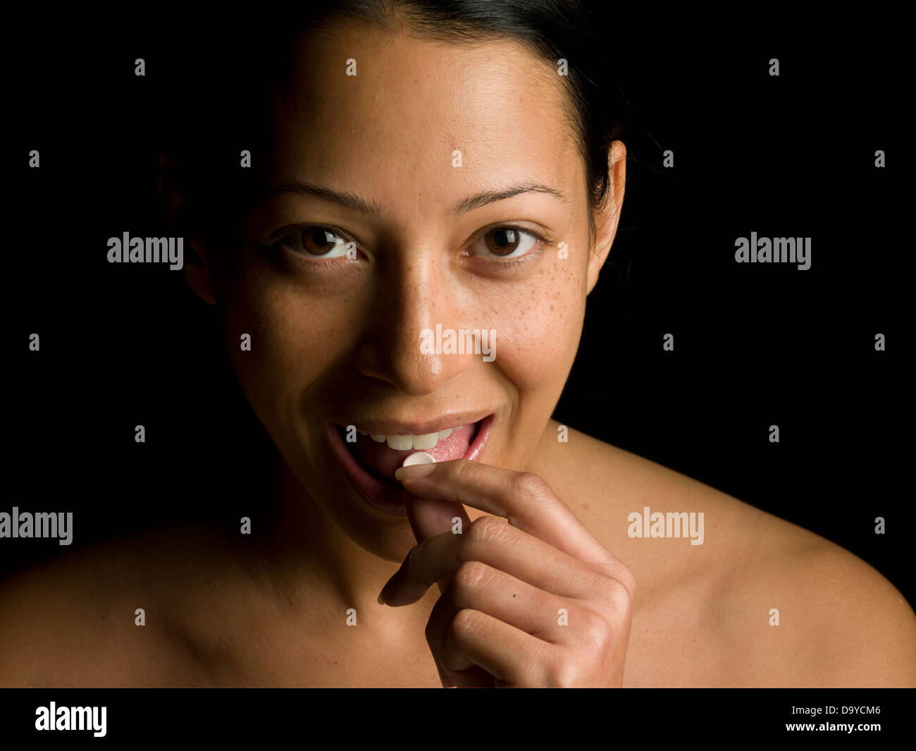 Woman with Vitamin Supplement Stock Photo