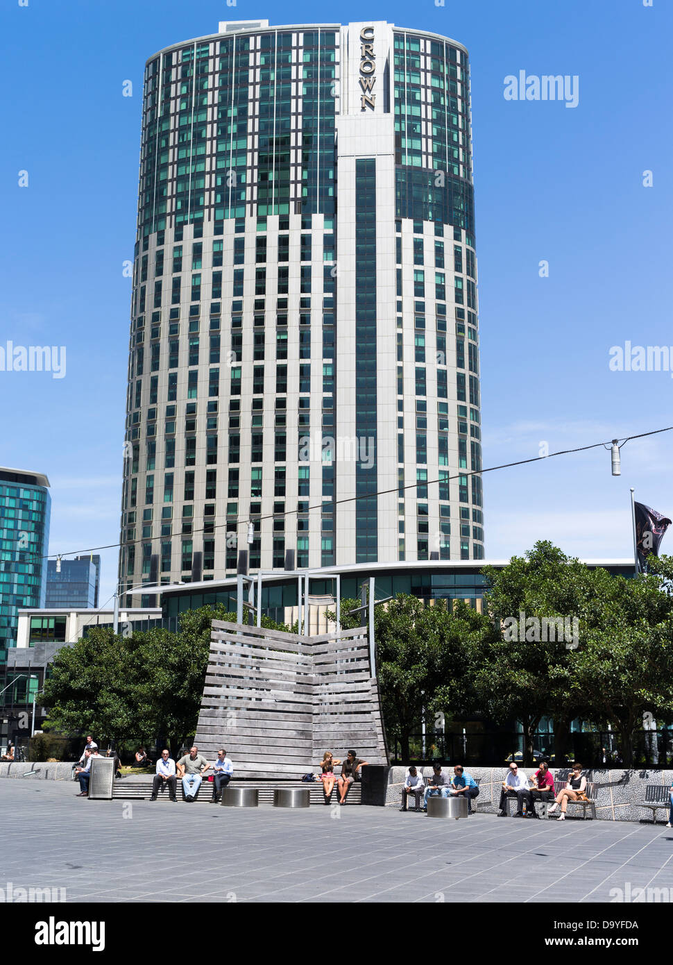 dh  MELBOURNE AUSTRALIA Crown Casino and entertainment centre Melbourne people sitting relaxing tower block hotel city exterior Stock Photo